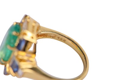 Lot 99 - An emerald, sapphire and diamond dress ring