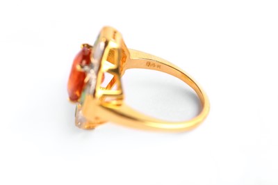 Lot 106 - A multi-gem and diamond dress ring