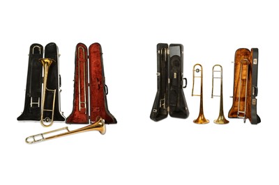 Lot 579 - Four trombones in cases, owned by John Howlett