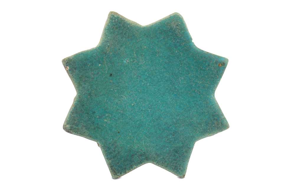 Lot 3 - A TURQUOISE-PAINTED STAR POTTERY TILE PROPERTY OF THE LATE BRUNO CARUSO (1927 - 2018) COLLECTION