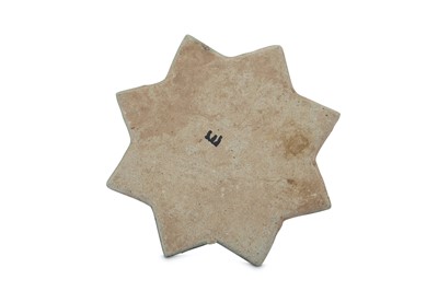 Lot 3 - A TURQUOISE-PAINTED STAR POTTERY TILE PROPERTY OF THE LATE BRUNO CARUSO (1927 - 2018) COLLECTION