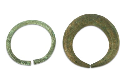 Lot 262 - AN ANCIENT BRONZE ANKLET AND A PENANNULAR BRACELET PROPERTY OF THE LATE BRUNO CARUSO (1927 - 2018) COLLECTION