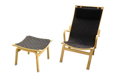 Lot 604 - A Danish Skippers Mobler lounge chair and stool