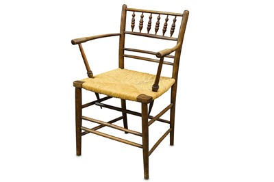 Lot 296 - A William Morris ash Sussex chair with turned...