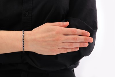 Lot 49 - A sapphire line bracelet