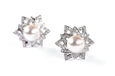 Lot 45 - A pair of cultured pearl and diamond earclips