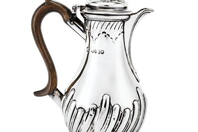 Lot 462 - A Victorian sterling silver hot milk pot, London 1886 by Daniel and John Welby