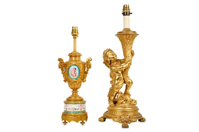 Lot 201 - A Louis XVI style gilt metal figural lamp base together with
another