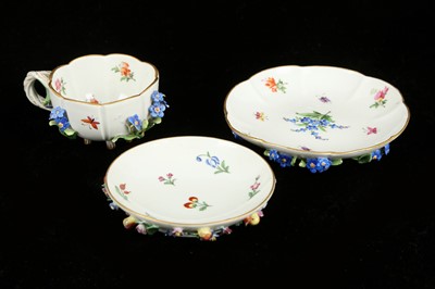 Lot 181 - A Meissen small cup and two saucers, mid 19th...