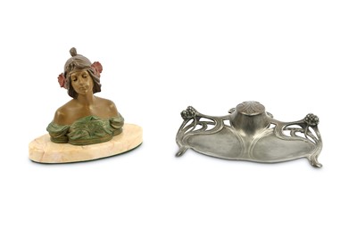Lot 217 - An Art Nouveau WMF relief-cast pewter inkwell,...