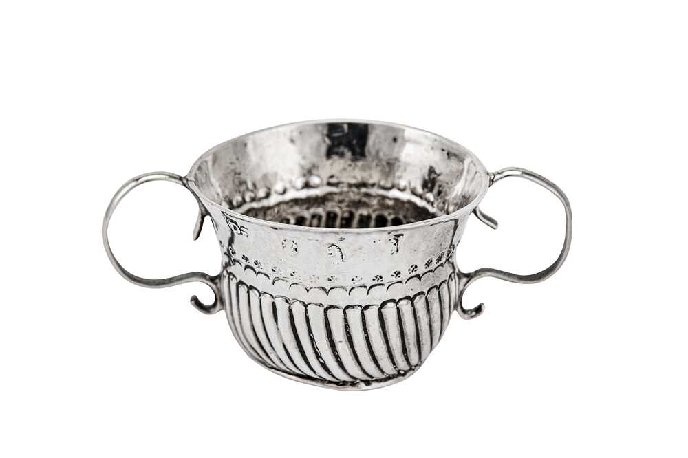 Lot 236 - A rare Queen Anne Britannia standard silver 'toy' miniature twin handled porringer or caudle cup, London 1703 by Matthew Pickering (reg. 23 Sep 1703)