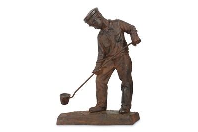 Lot 111 - A MID 20TH CENTURY RUSSIAN CAST IRON FIGURE OF A MAN SMELTING IRON