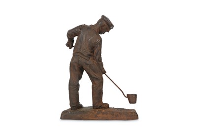 Lot 111 - A MID 20TH CENTURY RUSSIAN CAST IRON FIGURE OF A MAN SMELTING IRON