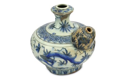 Lot 193 - *A BLUE AND WHITE POTTERY QALYAN BOTTLE