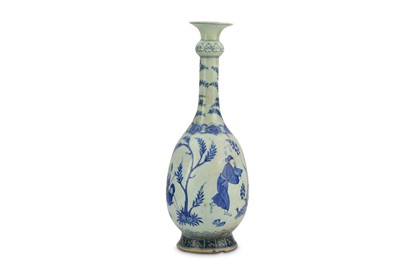 Lot 187 - *A CHINESE-STYLE BLUE AND WHITE POTTERY VASE