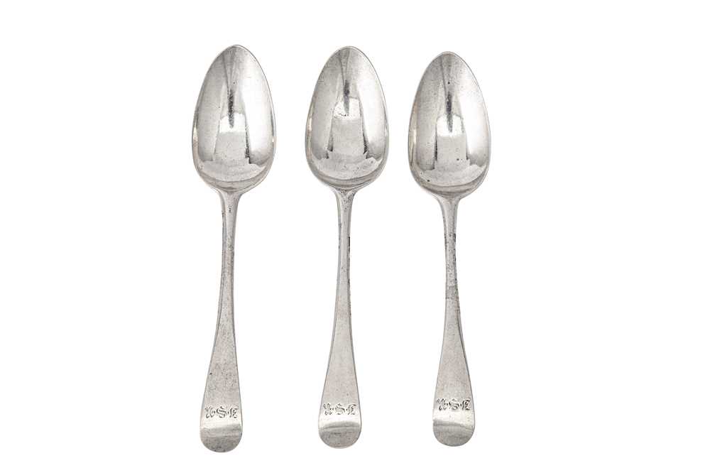 Lot 344 - A set of three George II sterling silver dessert spoons, London 1740/41 by Isaac Callard