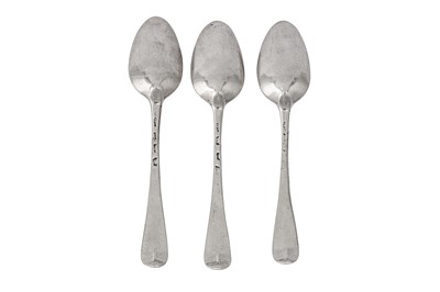 Lot 344 - A set of three George II sterling silver dessert spoons, London 1740/41 by Isaac Callard