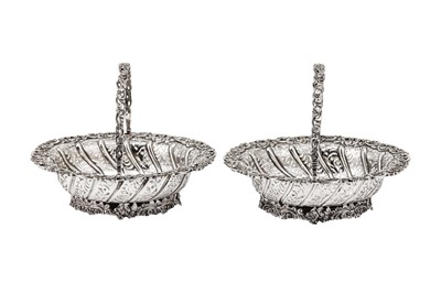 Lot 545 - A pair of George V sterling silver sweetmeat baskets, London 1916 by Lionel Alfred Crichton