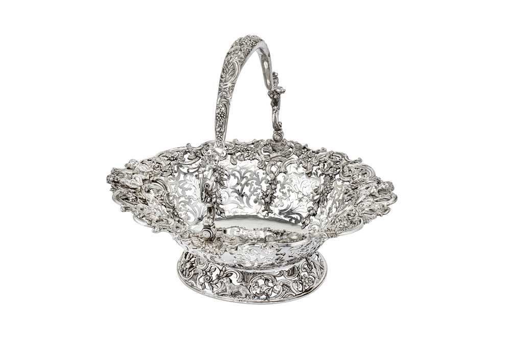 Lot 577 - Ernest, Duke of Cumberland - A large George II sterling silver basket, London 1759 by WilliamTuite