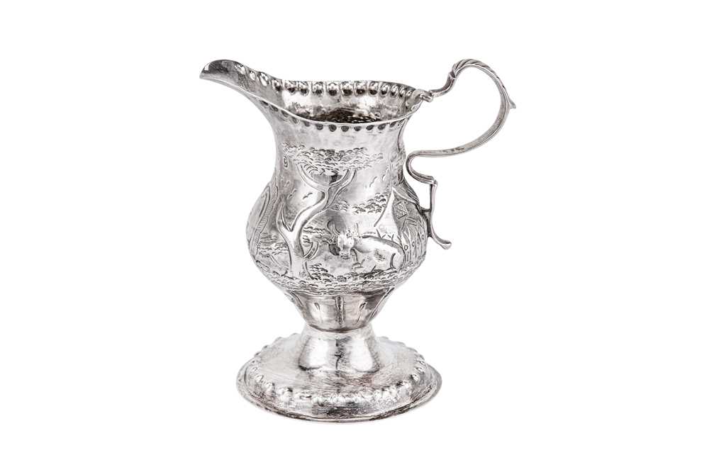 Lot 437 - A George III sterling silver cream jug, London 1778 possibly by George Smith I