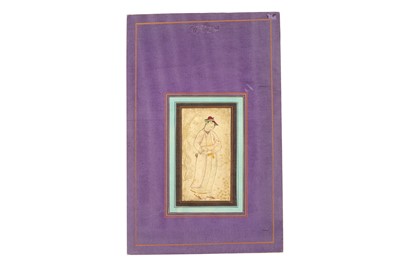 Lot 129 - *A YOUNG SHEPHERD HOLDING A FAWN