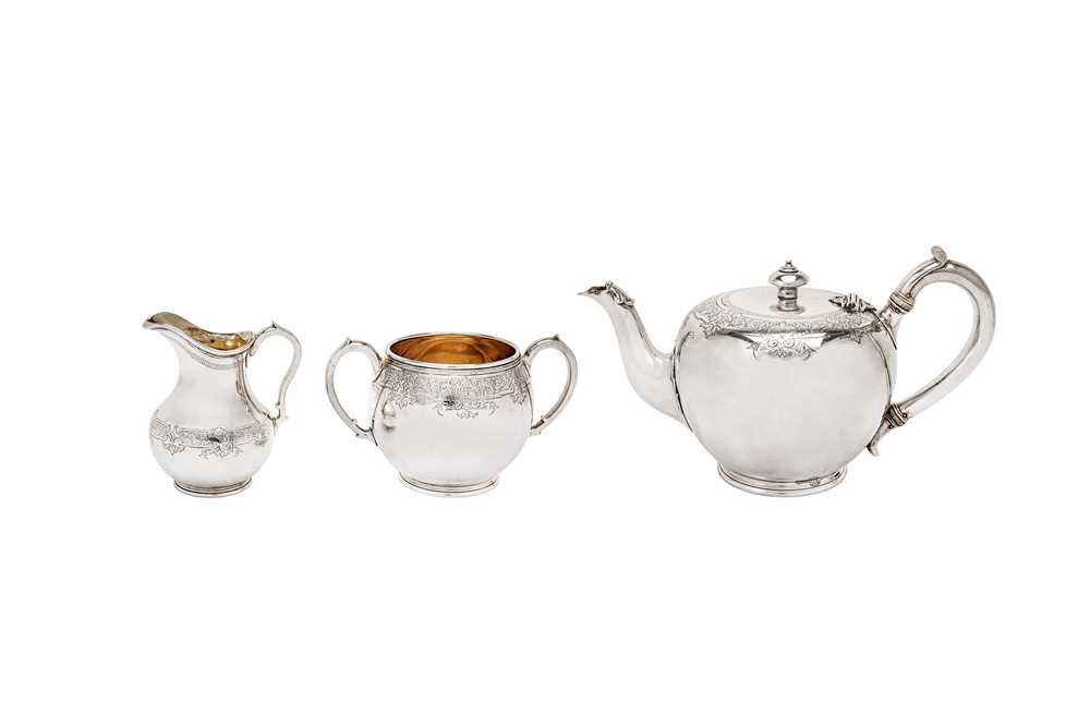 Lot 483 - A Victorian sterling silver three-piece tea service, London 1869/70 by John Samuel Hunt and Robert Roskell