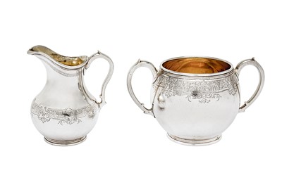 Lot 302 - A Victorian sterling silver three-piece tea service, London 1869/70 by John Samuel Hunt and Robert Roskell