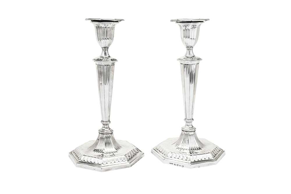 Lot 374 - A pair of George III sterling silver candlesticks, Sheffield 1788 by John Parsons & Co (reg. July 1783)
