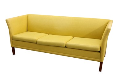 Lot 362 - A Danish three seater sofa with lemon fabric...
