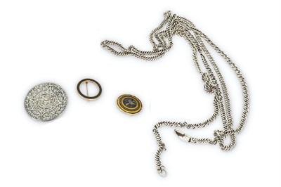 Lot 137 - A shakudo brooch, the clasp stamped 141 with a...