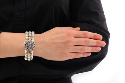Lot 10 - A cultured pearl and diamond cocktail watch, circa 1985