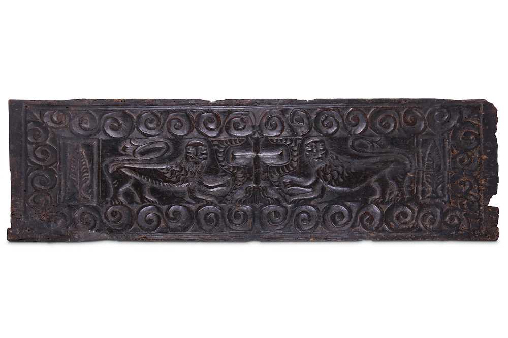 Lot 44 - AN EARLY MEDIEVAL CARVED WOOD RELIEF PANEL...