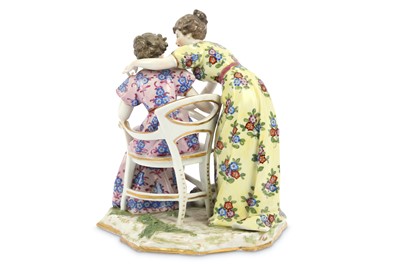 Lot 148 - An early 20th Century porcelain figural group...