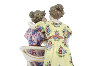 Lot 148 - An early 20th Century porcelain figural group...