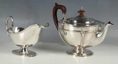 Lot 395 - An early 20th Century hallmarked silver teapot...