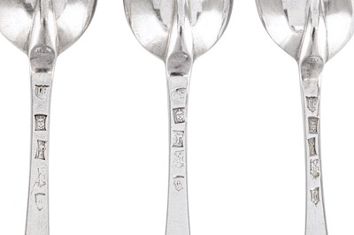 Lot 337 - A set of three George I provincial sterling silver table spoons, Exeter 1721 by John Elston I (died 1732-33)