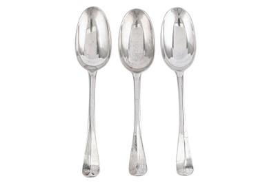 Lot 337 - A set of three George I provincial sterling silver table spoons, Exeter 1721 by John Elston I (died 1732-33)