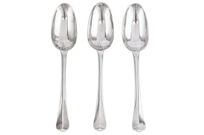 Lot 336 - A set of three George I sterling silver tablespoons, London 1722 by Hugh Arnott and Edward Pocock (reg. 15th Feb 1720)