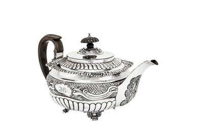 Lot 478 - A George IV sterling silver part-tea service, the teapot London 1821 by Stephen Adams II (reg. 14th Nov 1813)