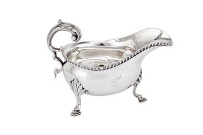 Lot 549 - A Victorian sterling silver sauceboat, London 1886 by James Garrard