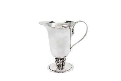 Lot 342 - A George V sterling silver cream or milk jug, London 1930 by Charles Boyton