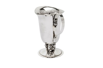 Lot 523 - A George V sterling silver cream or milk jug, London 1930 by Charles Boyton