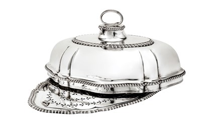 Lot 574 - A matched George II / George III sterling silver meat dish and cover, the base London 1748 by Charles Fredrick Kandler (reg. 10 Sep 1735)