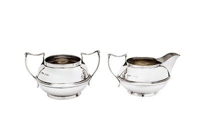 Lot 466 - A George V sterling silver three-piece bachelor tea service, Birmingham 1922 by Wilmot Manufacturing Co