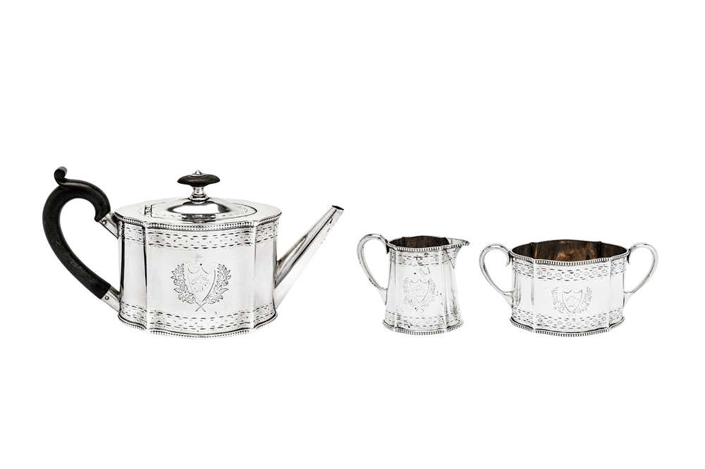 Lot 463 - A Victorian sterling silver bachelor three-piece tea service, London 1869/70 by William Hunter