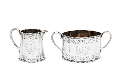 Lot 463 - A Victorian sterling silver bachelor three-piece tea service, London 1869/70 by William Hunter