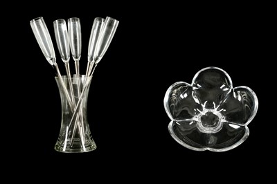 Lot 407 - Six champagne stem glasses with silvered stem in a waisted clear glass vase