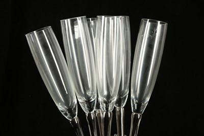 Lot 407 - Six champagne stem glasses with silvered stem in a waisted clear glass vase