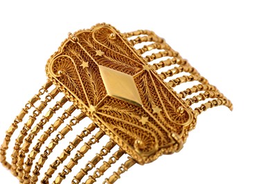 Lot 125 - A multi-strand filigree bracelet