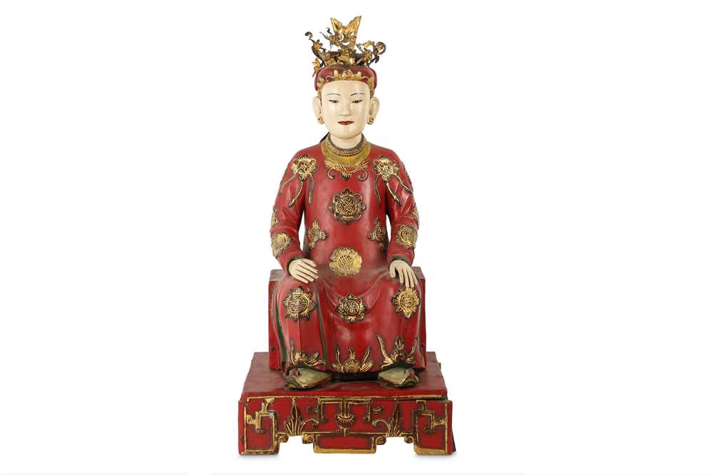 Lot 450 - A VIETNAMESE LACQUERED WOOD FIGURE.